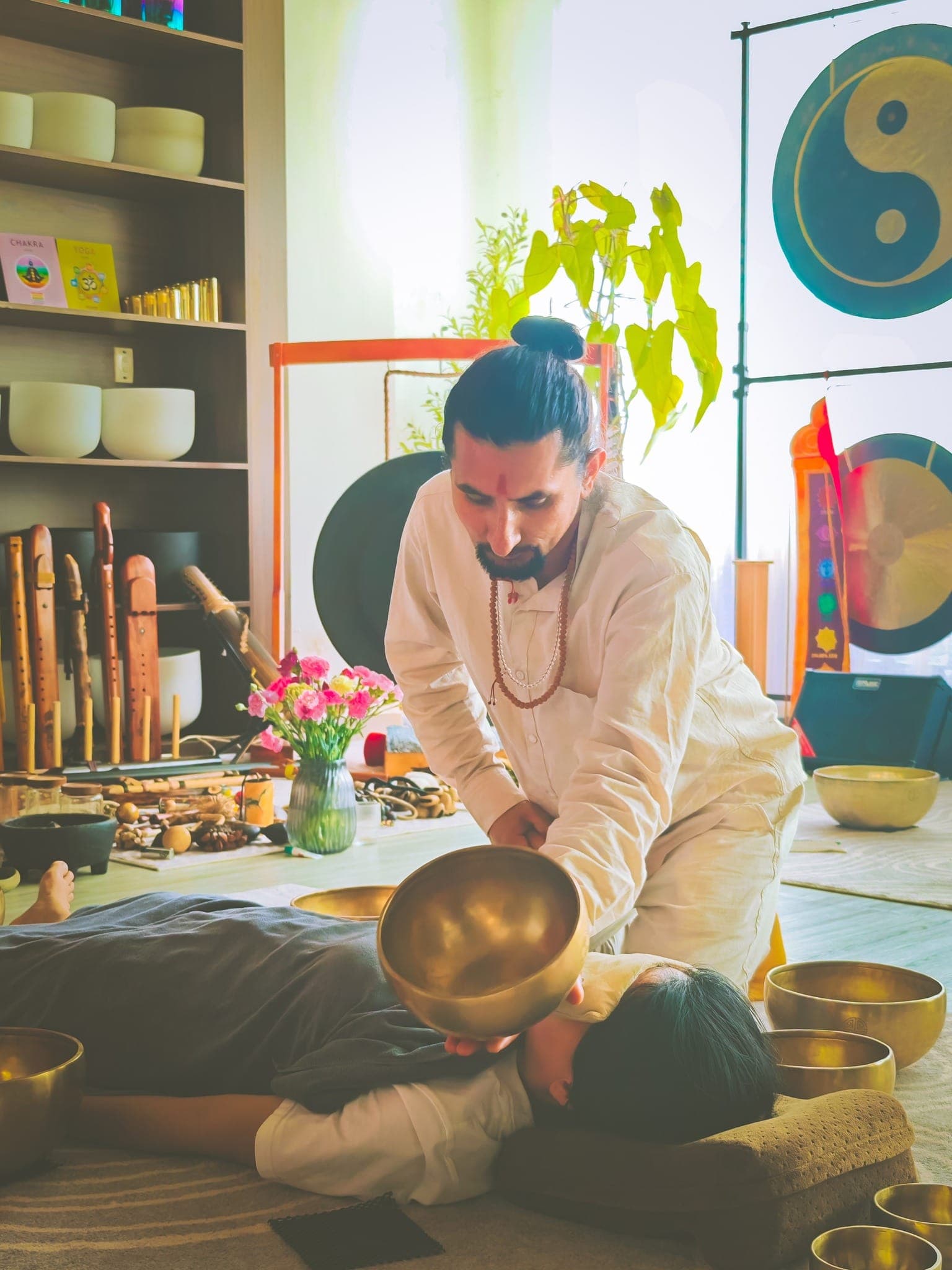 A sound healing treatment during a morning retreat session