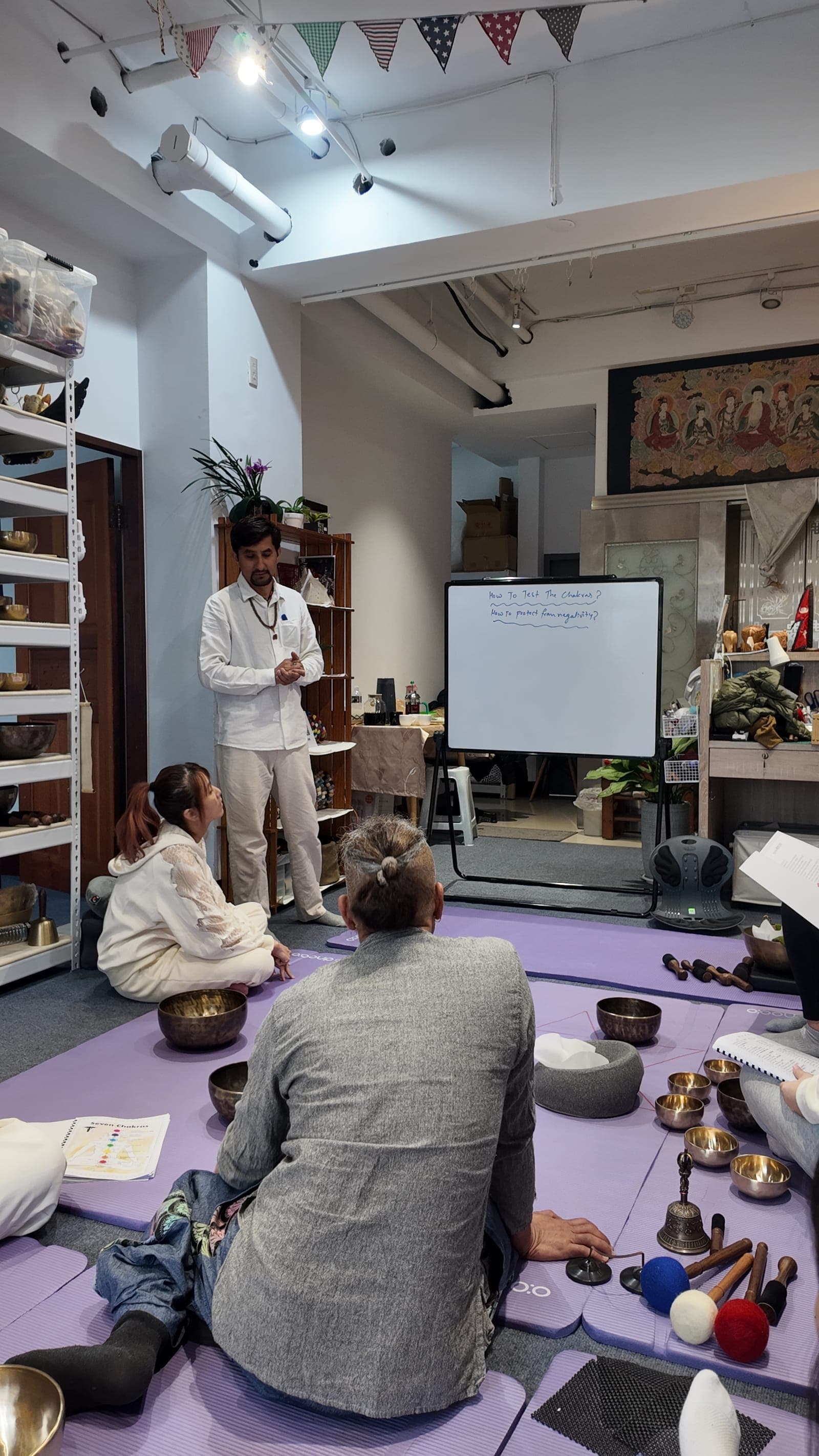 Grand Master Akash Banjara leading a singing-bowl training class