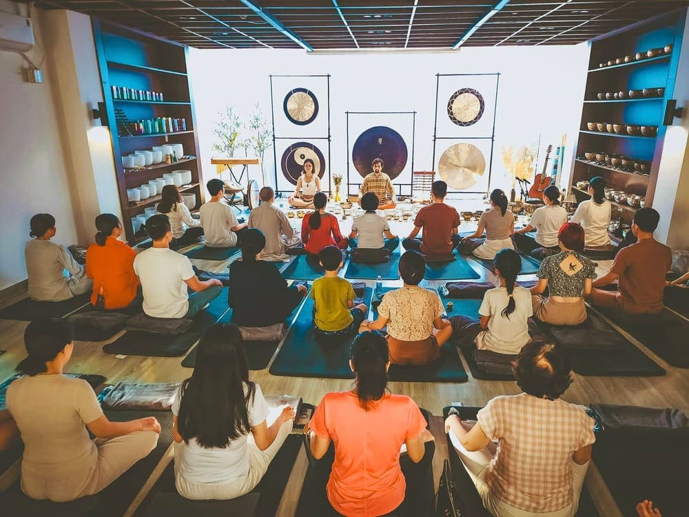 A group sound relaxation class led by the school